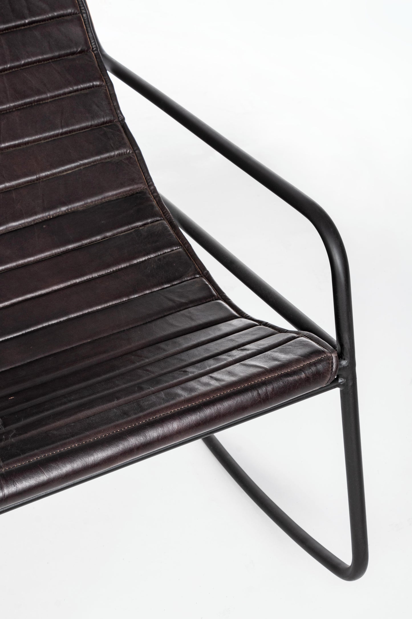 Poltrona dondolo design acciaio e vera pelle