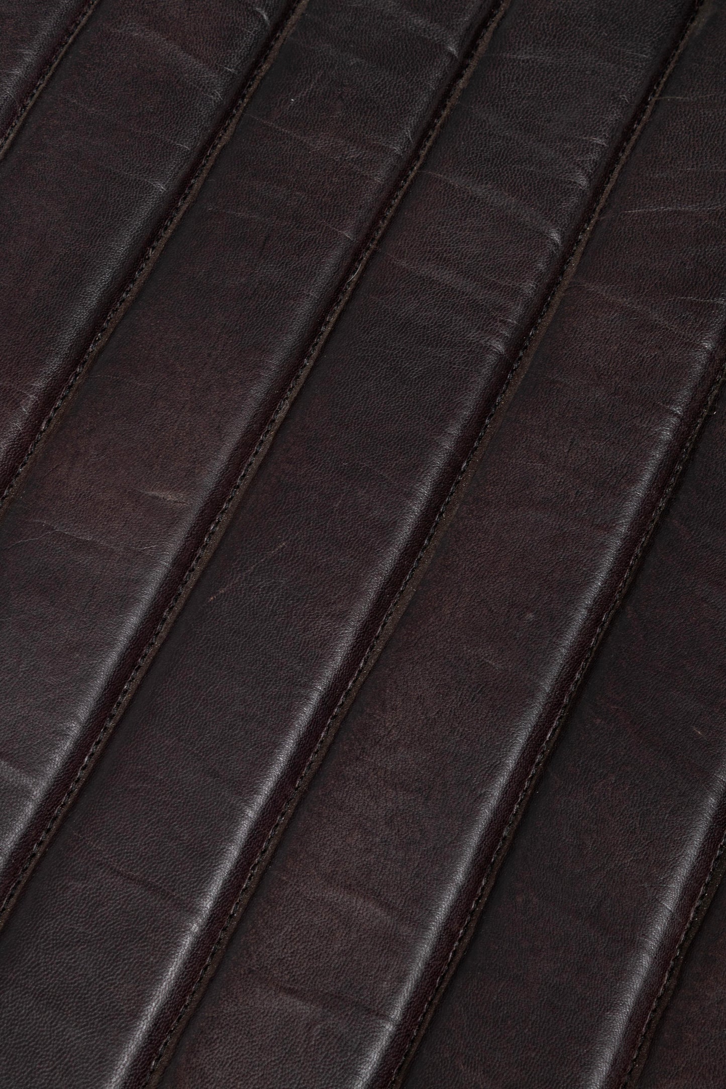 Poltrona dondolo design acciaio e vera pelle