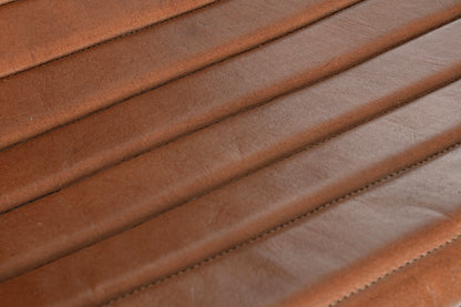 Poltrona dondolo design acciaio e vera pelle