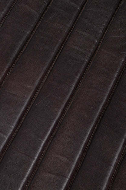 Poltrona dondolo design acciaio e vera pelle